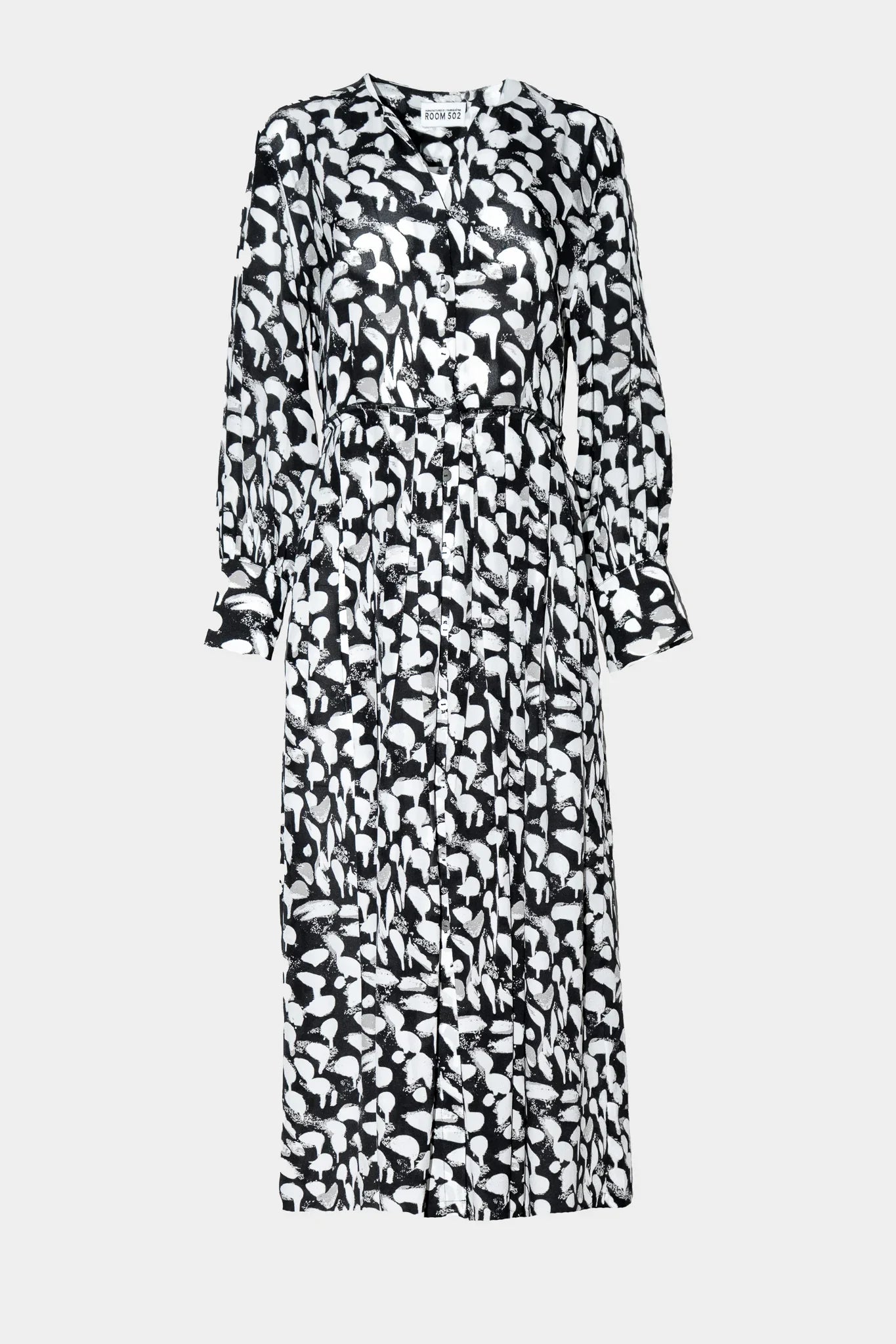 Black and white patterned dress on a light gray background