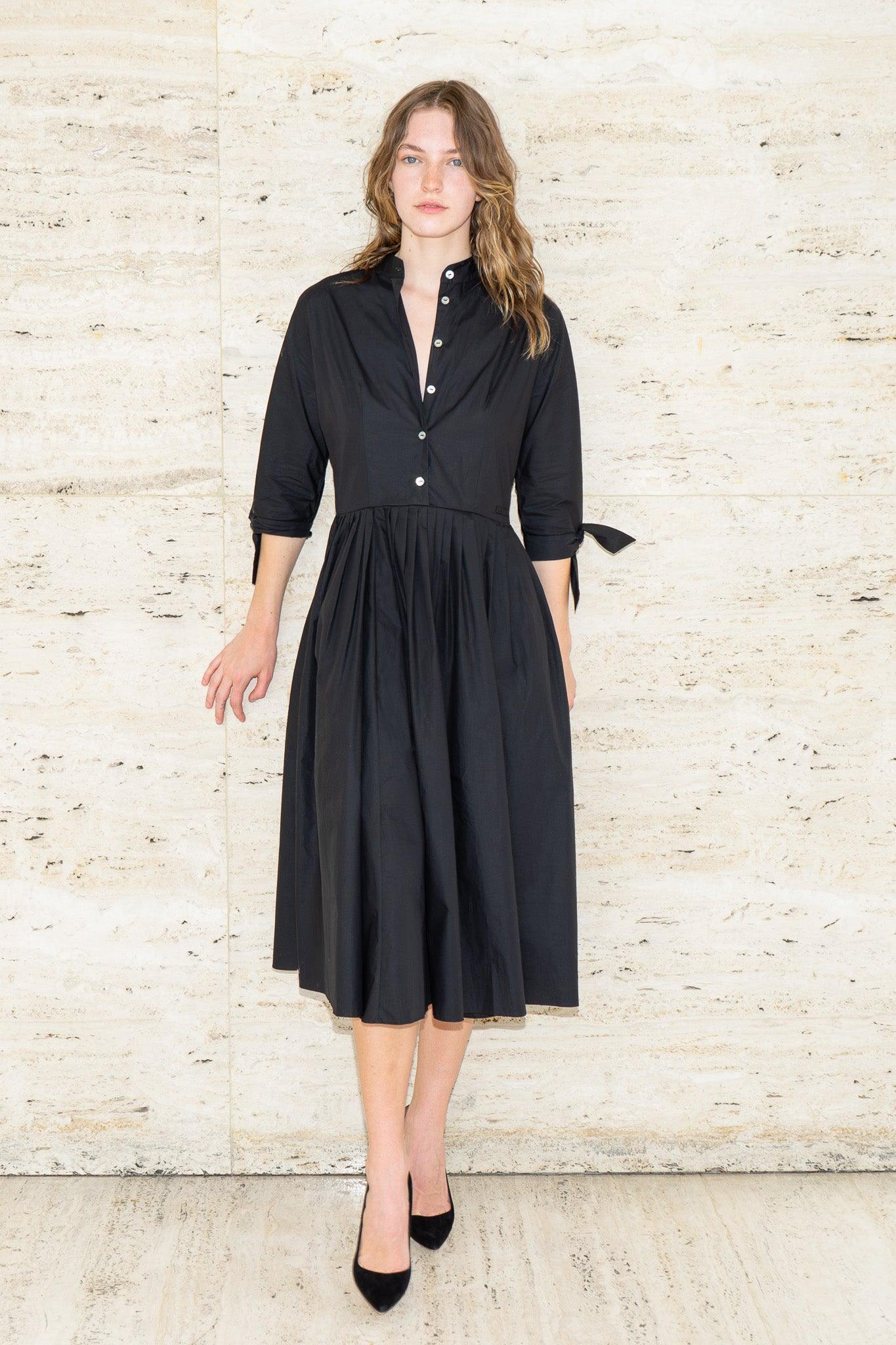 riviera shirt dress Introducing the Riviera Shirt Dress. Designed in an oversized maxi silhouette with an effortless sense of ease, it can be worn cinched at the waist or relaxed for versatile summer styling. Finished