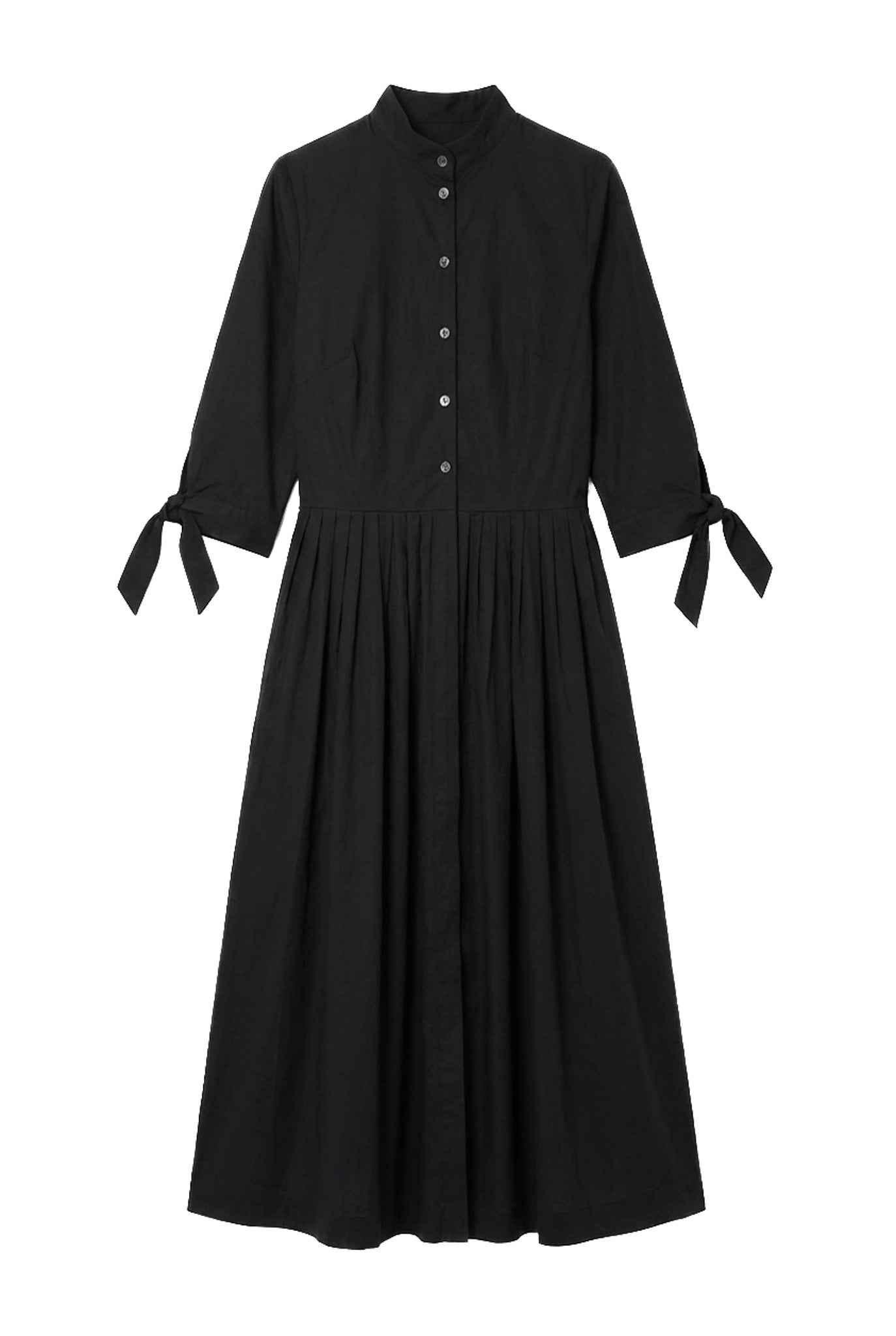 Black shirtdress with button details on a white background