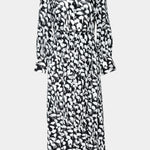 Black and white patterned dress on a light gray background
