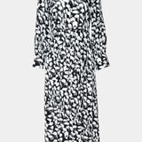 Black and white patterned dress on a light gray background