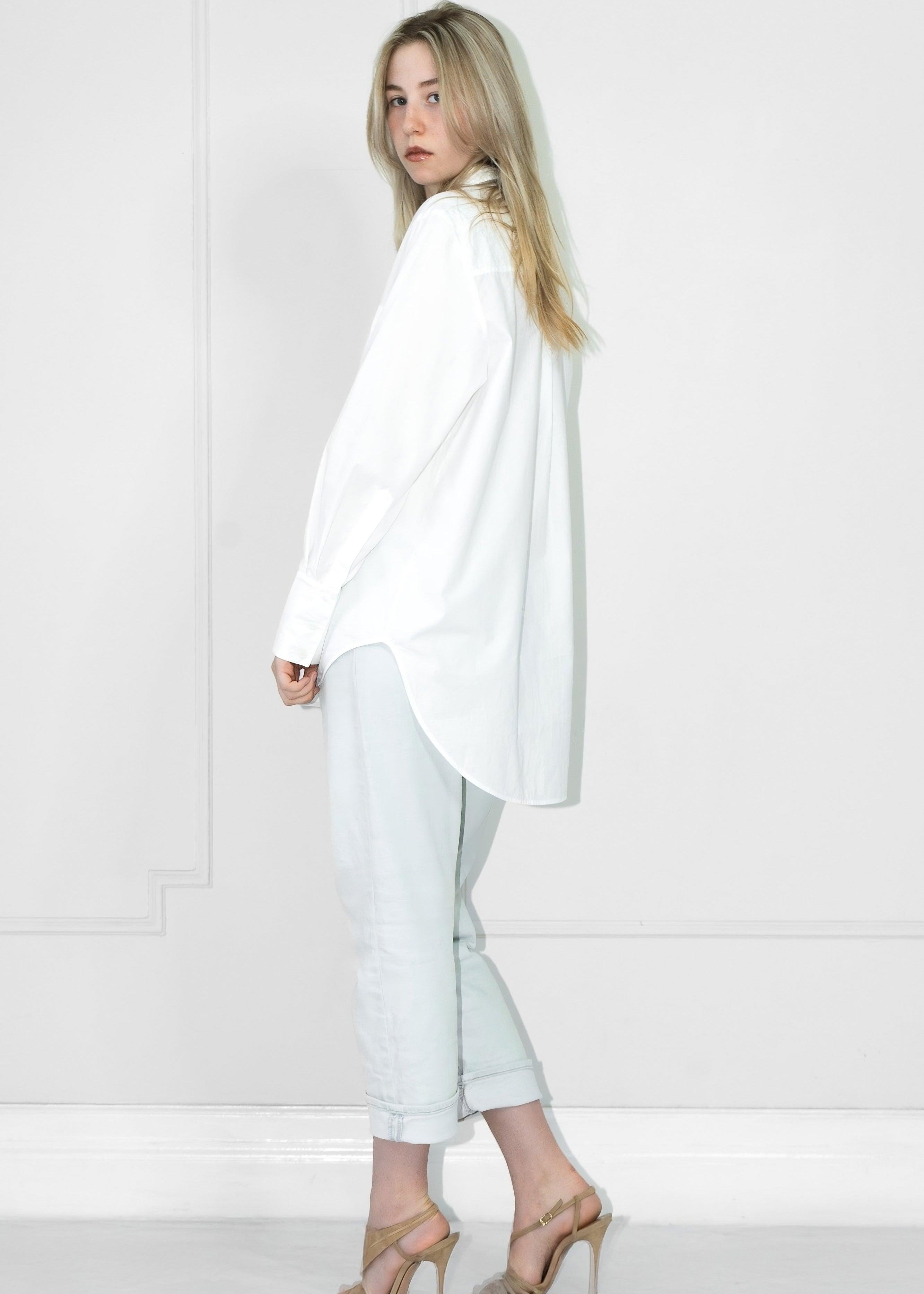 White shirt back view longer hem detail relaxed fit